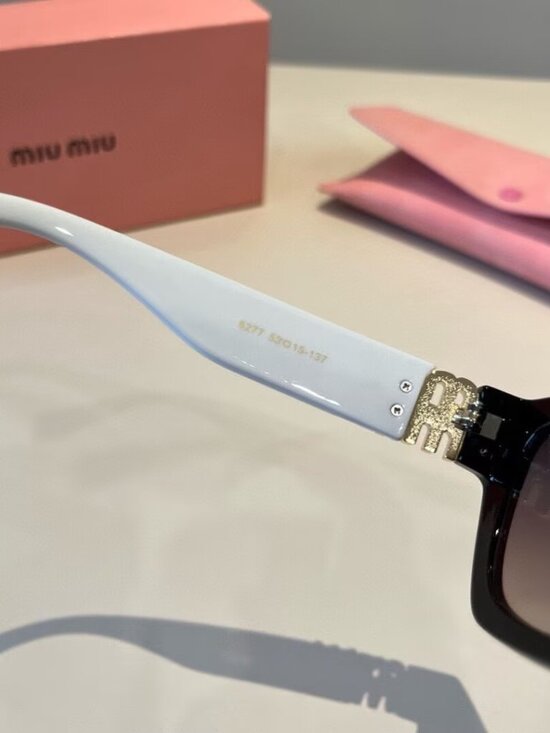 Miu Miu Black Front White Temple Cat- Eye Sunglassos